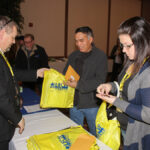 Receiving conference materials at registration