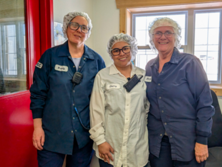 MakersPride members posing and smiling in-front of the camera.