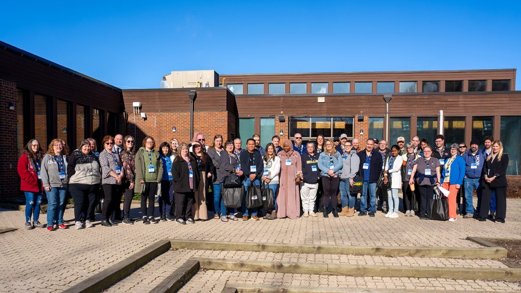 UFCW 175 Staff, E-Board Members, and Stewards stand outside for a group photo. The photo holds approximately 40 people