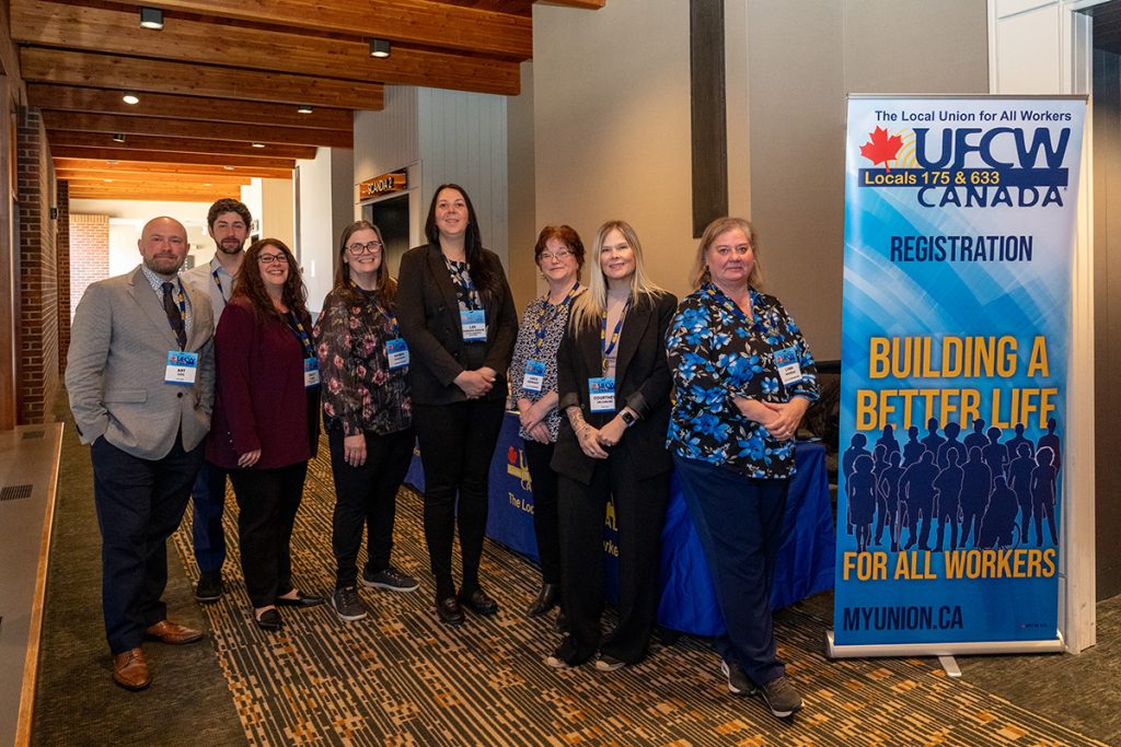 UFCW Locals 175 & 633 Staff group picture by the registration desk