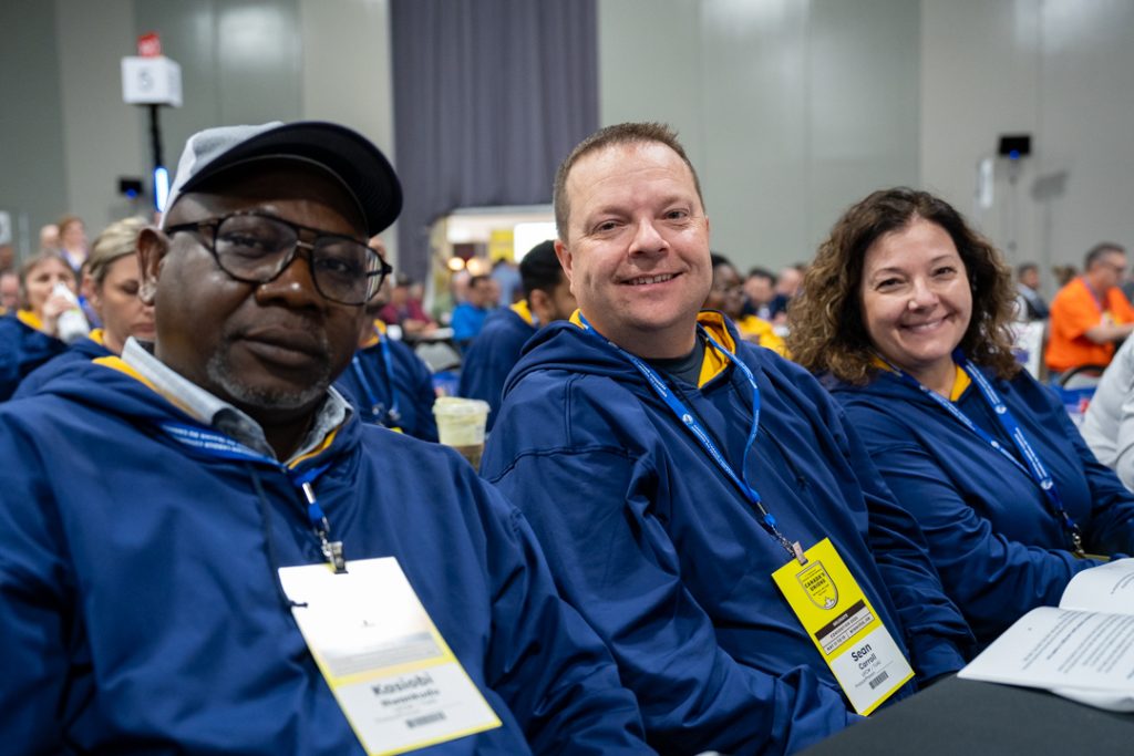 3 people seated at the CLC convention 2026
