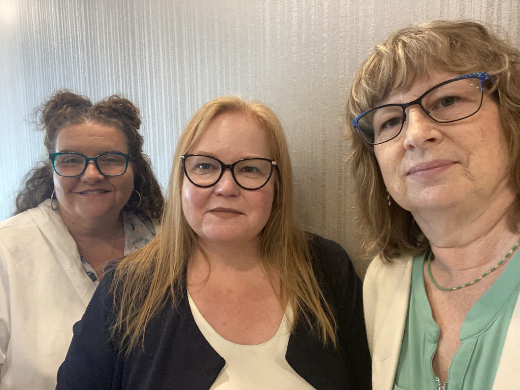 Livita Barrington Negotiation Committee take a group selfie